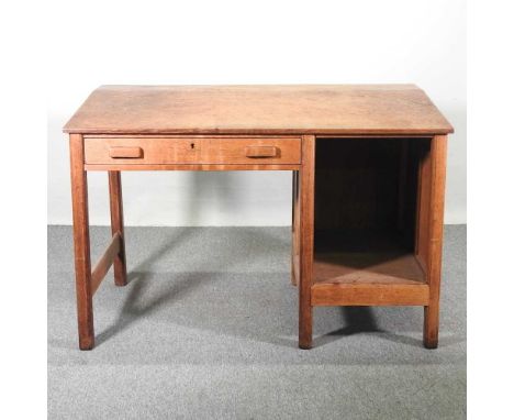 A mid 20th century light oak architect's desk, bearing a label for Betula124w x 75d x 82h cm