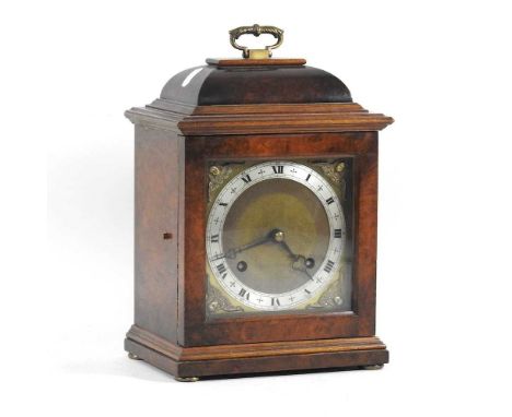 An early 20th century walnut cased mantel clock, with a twin train movement, stamped Imperial, 30cm high 