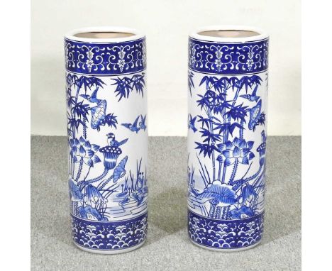 A pair of Chinese porcelain stick stands, decorated with bamboo, 60cm high (2)