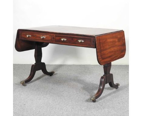 A Regency mahogany and ebony strung sofa table, with a hinged top, on splayed legs164w x 68d x 71h cm