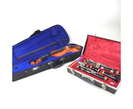 A Boosey &amp; Hawkes Regent clarinet, cased, together with a Stentor Student I eleven inch violin, 46cm long, in a soft case