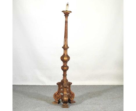 A large Italian style carved gilt wood standard lamp, 178cm high