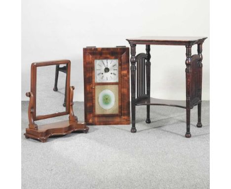 An early 20th century occasional table, 79cm high, together with a Victorian toiletry mirror and a shelf clock (3)