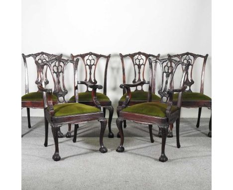 A set of six early 20th century Chippendale style dining chairs, to include a pair of elbow chairs (8)These are solid and usa