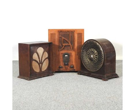 A 1930's walnut cased valve radio, 51cm high, together with another smaller and a speaker (3)