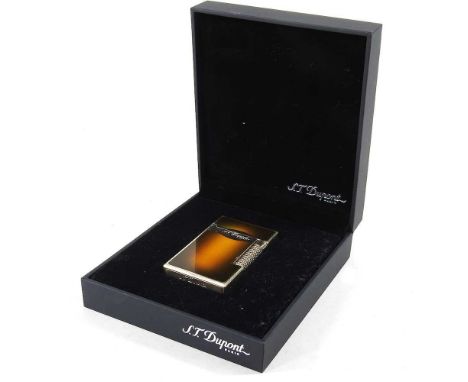 An S. T. Dupont Le Grand dual flame pocket cigar lighter, with a gilt sunburst case, stamped 1953, boxed, with receipt from H