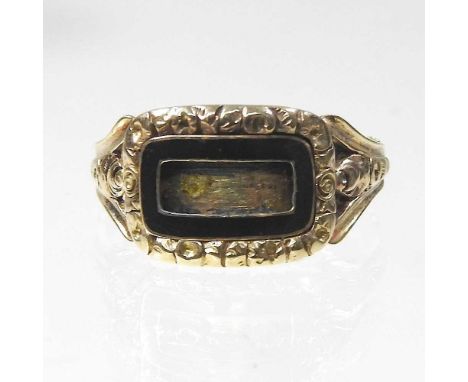 A George IV enamelled mourning ring, with a scrolled surround, inscribed to Polley November 1819, aged 66, 3.6g, size S