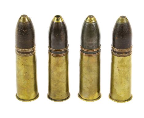 A Collection of Four First World War French Inert 35mm Brass Shells, each with steel projectile and brass fuse, the underside