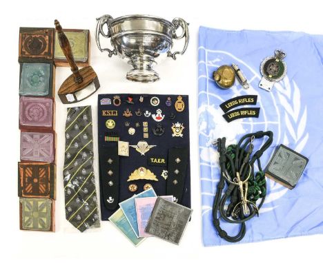 A Quantity of Militaria, including items related to the Leeds Rifles comprising a car badge, tie, a presentation gavel, embro