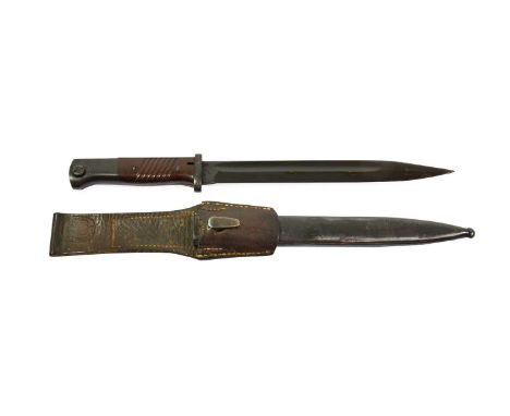 A Second World War German K98 Rifle Bayonet, the 25.5cm single edge fullered blued steel blade stamped P.WEYERSBERG to one si