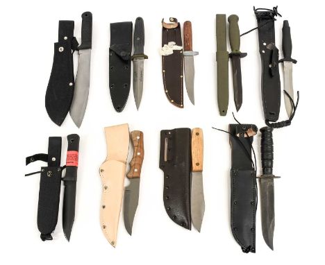 A US Applegate-Fairbairn A2 Combat Knife, the brass crossguard numbered 03303, with fluted grey plastic grip and leather scab