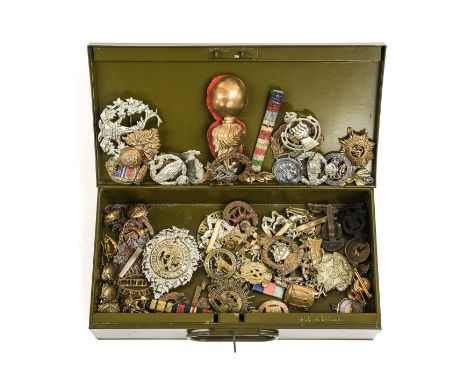 A Collection of Approximately Sixty Various Military Badges, including cap, glengarry and collar badges, shoulder titles, ran