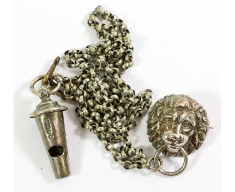 A Victorian Rifle Brigade Silver Whistle, for a crossbelt, hallmarks for Birmingham 1899, on a white metal chain and lion mas