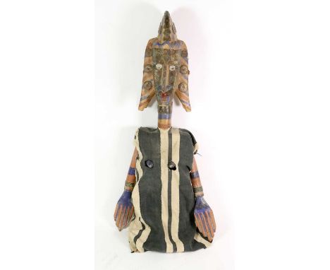 A Bamana, Mali Sogo Bo (Masquerade) Puppet, carved as the "Bad Wife", in wood painted with bands of red and blue, the face an