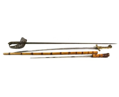 An 1831 Pattern Cavalry Officer's Mameluke Sabre, the 69cm single edge curved steel blade faintly etched with a stand of arms