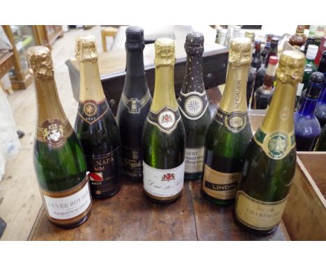 Seven various 75cl bottles of sparkling wine, to include: Harrods Grand Cru Blanc de Blanc champagne; and Freixenet 1986 vint