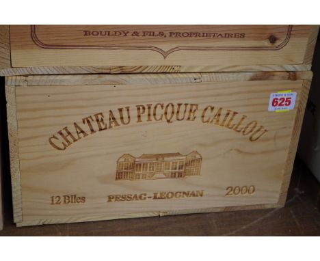 A case of twelve 75cl bottles of Chateau Picque Caillou, 2000, in owc. (12)PLEASE NOTE: ADDITIONAL VAT ON THE HAMMER PRICE. 