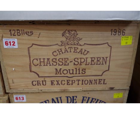 A case of twelve 75cl bottles of Chateau Chasse Spleen,&nbsp;1986, in owc. (12)PLEASE NOTE: ADDITIONAL VAT ON THE HAMMER PRIC
