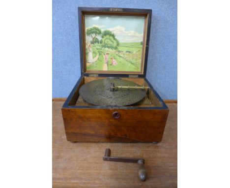 A 19th Century walnut table top polyphon music box 