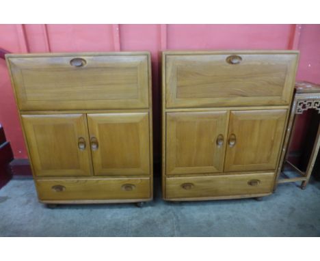 A pair of Ercol Blonde elm 469 model cabinets 