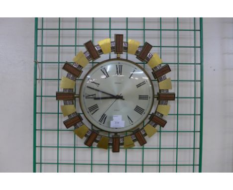 A vintage Metamec wall hanging clock 