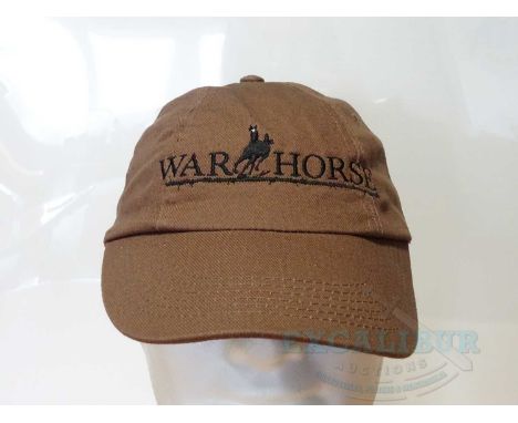 WAR HORSE (2011) - A group of three crew clothing items comprising a brown cap ; a black short sleeved 'Stunt Crew' M t-shirt