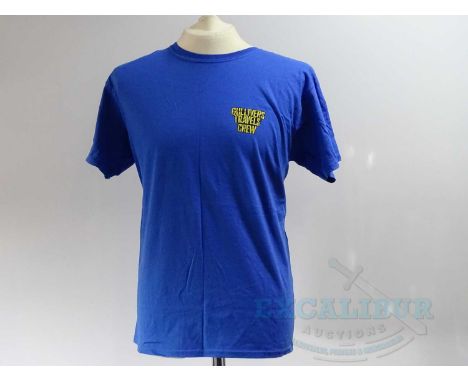 GULLIVER'S TRAVELS (2010) - A group of three crew clothing items comprising a blue short sleeved L t-shirt ; a red short slee