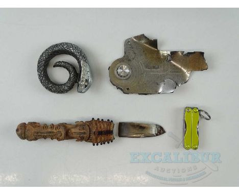 THUNDERBIRDS (2004) A group of screen used prop items comprising: FERMAT's gold painted 'Leatherman' multi tool; THE HOODS's 