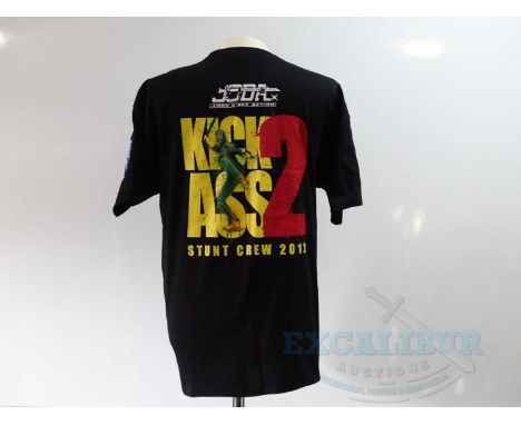 KICK-ASS 2 (2012) - A pair of crew clothing items comprising a black short sleeved 'Stunt Crew' XXL t-shirt and a black cap -