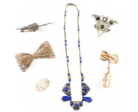 A collection of costume brooches and a Czech necklace. The collection to include a Cord Fab Suisse brooch watch. A Czech neck