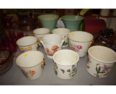 A collection of modern ceramic jardinieres, including two by Portmeirion in 'Botanic Garden' pattern; and a pair of Scottish 