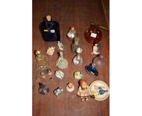 A collection of decorative Studio glass scents and other bottles; together with miscellaneous ceramic ornaments, including tw