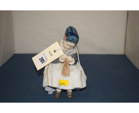 Royal Copenhagen ceramic figure of an Amager Girl Model No. 1314.