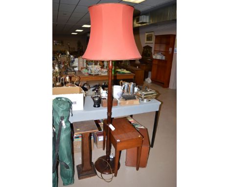 A standard lamp and shade; an oak plant stand; a 19th Century mahogany commode stool with tapering legs; and a leather covere