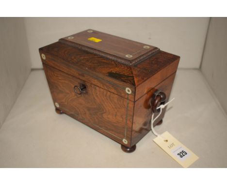 A Victorian  sarcophagus shaped rosewood tea caddy, with mother-of-pearl and white metal inlay, turned hoop handles, opening 