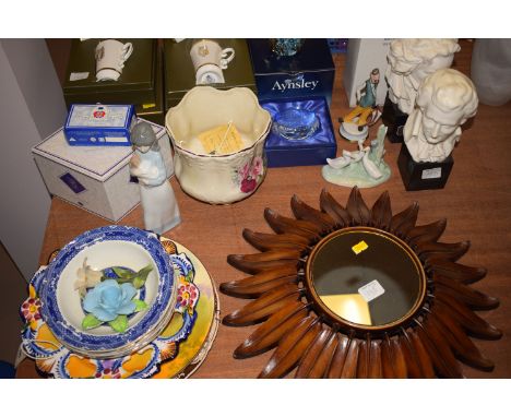 A small circular mirror in wooden sunburst style frame; a pair of Royal Worcester ceramic coffee cans and saucers, in origina