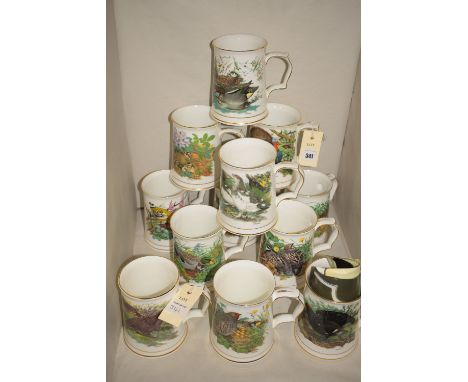 A set of twelve Hammersley Danbury Mint tankards, 'The Game Birds Tankard Collection', designed by Maurice Pledger.