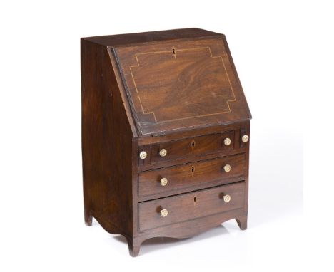 A 19TH CENTURY MAHOGANY MINIATURE BUREAU, with box strung fall front enclosing fitted interior, above three long drawers, on 