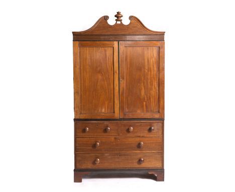 AN EARLY 19TH CENTURY ANGLO INDIAN TEAK LINEN PRESS, the interior of the upper half fitted four slides enclosed by panelled d