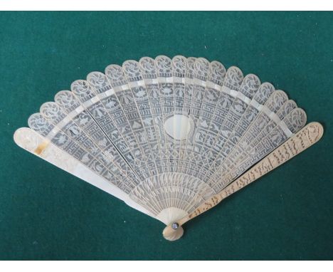 HEAVILY CARVED CHINESE IVORY STICK FAN 