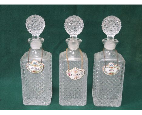 SET OF THREE GLASS DECANTERS WITH CERAMIC DRINKS LABELS 