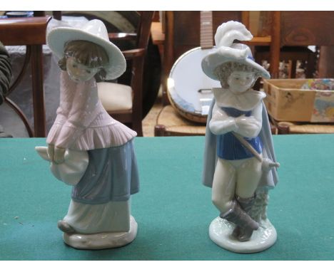 TWO NAO GLAZED CERAMIC FIGURES