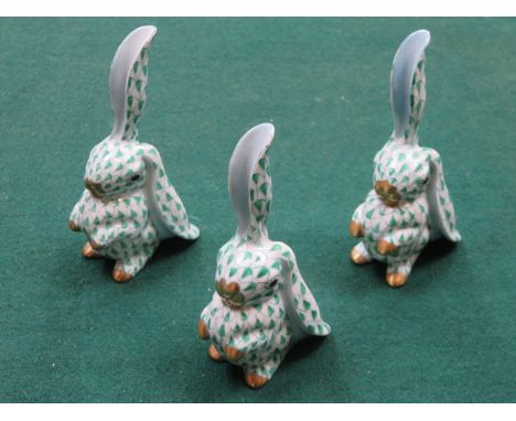 HEREND HUNGARY THREE CERAMIC RABBITS, HANDPAINTED AND GILDED, APPROXIMATELY 11cm HIGH