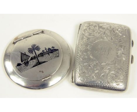 A GEORGE V SILVER CIGARETTE CASE, 8CM W, BIRMINGHAM 1911 AND AN EGYPTIAN SILVER AND NIELLO COMPACT, 4OZS 10DWTS GROSS