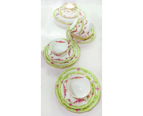 A WEDGWOOD BONE CHINA FLUTED APPLE GREEN GROUND CUP AND SAUCER DECORATED WITH SWAGS AND A CONTEMPORARY EARLY 20TH CENTURY STA