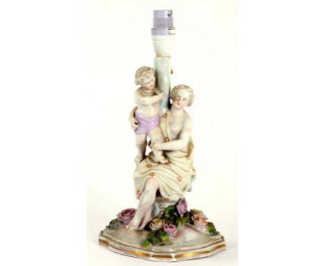 A GERMAN PORCELAIN FLORAL ENCRUSTED FIGURAL CENTREPIECE, ADAPTED AS A LAMP, 26CM H, EARLY 20TH CENTURY