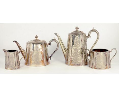A VICTORIAN EPNS TEA AND COFFEE SERVICE DECORATED WITH LUXURIANT FOLIAGE, COFFEE POT 23CM H