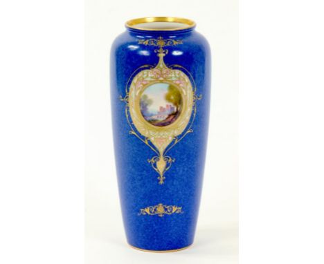 A ROYAL WORCESTER POWDER BLUE GROUND VASE, PAINTED BY RUSHTON, SIGNED WITH A CASTLE AND BRIDGE IN A GILT RESERVE, 21CM H, PUC