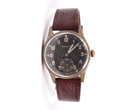 DH marked Buren wristwatch. Serial D 24394 H. Plated case, almost all plating worn away, pitting to underlying brass, 33mm wi