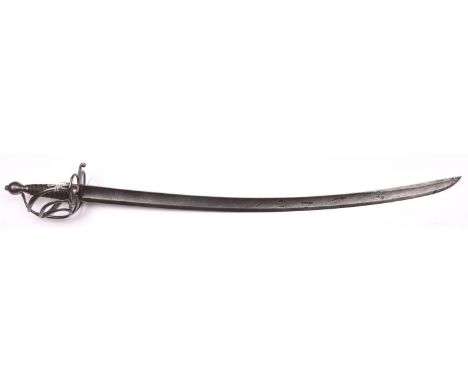 A European (German?) cavalry officer’s sword, c 1760-1780, broad slightly curved blade 34” engraved with trophies, the barred